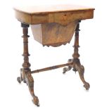 A Victorian walnut and marquetry work table, the rectangular quarter veneered top with a moulded