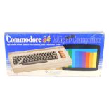 A Commodore 64 Microcomputer, boxed.