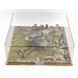 A 1:48 scale diorama of a WW2 Spitfire, perspex cased.