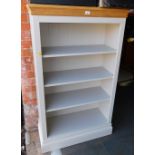 An oak and grey painted bookcase, enclosing three adjustable shelves.