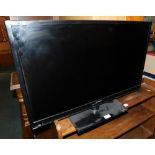 A Panasonic 32 inch LCD television model TX-L32EM6B, lacking lead and remote.