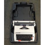 A cased typewriter.