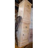 A pair of pine bedside cabinets.