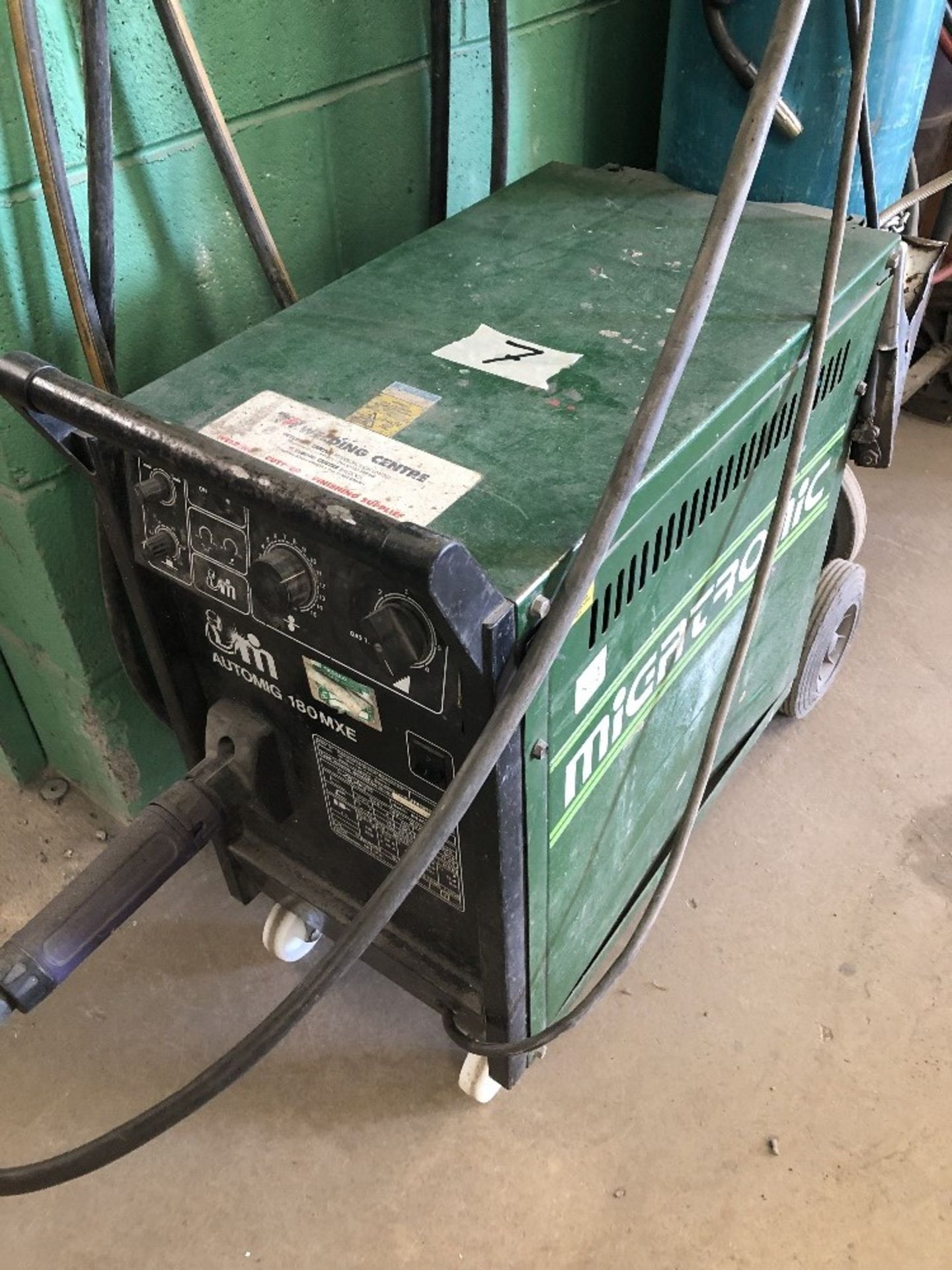 A Migatronic 180 MXE automig welder, no bottle.