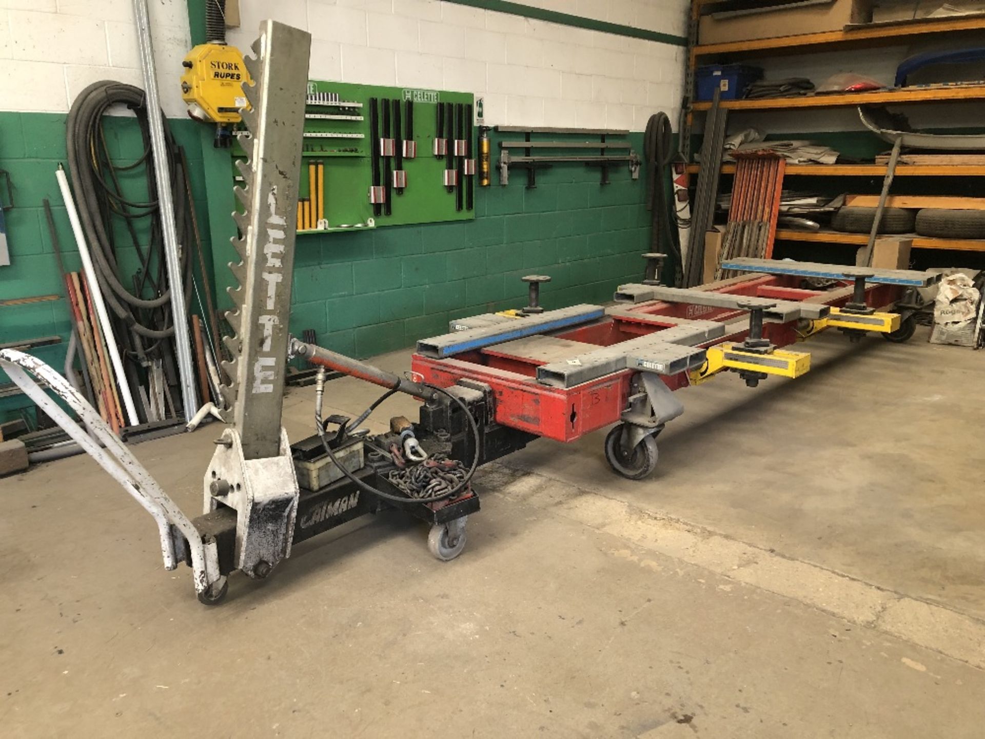 A Celette body jig, with beams and towers and a Calman dozer.