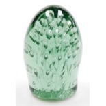 A Victorian green glass dump weight, with air bubble inclusions, 11cm high.
