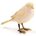 An early 20thC ivory carving of a small bird, 6cm high.