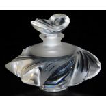 A Lalique Samoa glass scent bottle and stopper, the stopper modelled in the form of a shell, the bot