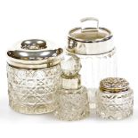 A group of cut glass and silver mounted dressing table bottles, to include a small scent bottle with