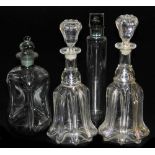 A pair of Victorian glass mallet shaped decanters and stoppers, an hour glass decanter and stopper,