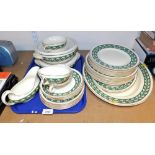 A group of Booths part dinner wares, decorated with a green band with flowers against a cream ground