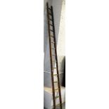 A wooden step ladder, possibly for apple picking, approx 4m high. Lots 1501 to 1561 are available to