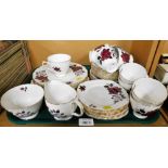 A Colclough part tea service, decorated with roses against a white ground (1 tray)