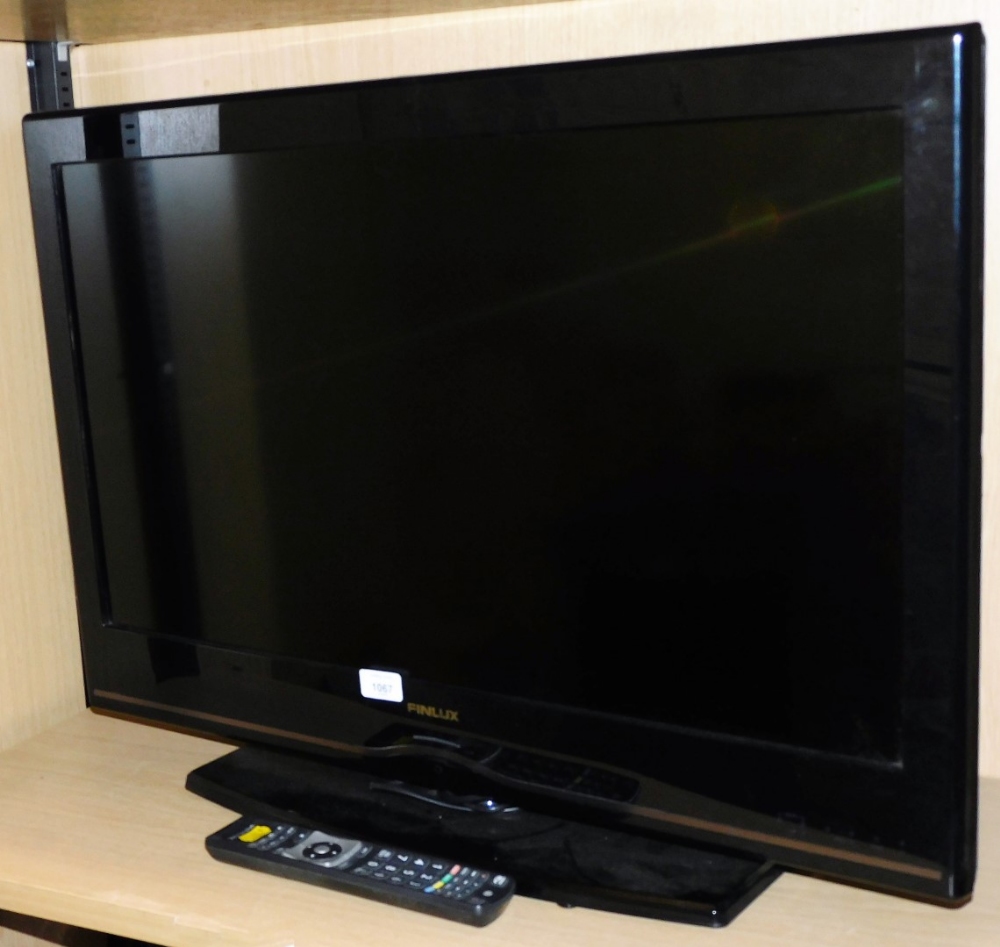 A Finlux 31" flat screen television, with lead and remote.