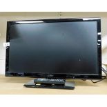 A Celcus 21" flat screen television, with lead and remote.
