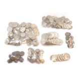 A group of mixed coinage, comprising shillings, farthings, half crowns, pre 1947, shillings from the
