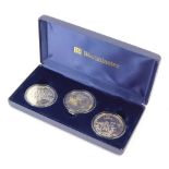A Duke of Wellington Jersey Guernsey and Alderney 2002 silver proof coin set, with three silver £5 c