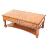 A late 20th walnut rectangular coffee table, with two single drawers, on a fluted design base, 44cm