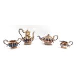 A Garrad & Co silver plated four piece tea service, comprising coffee pot, teapot, milk jug and suga