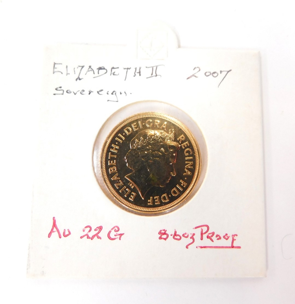 An Elizabeth II full gold sovereign, dated 2007.