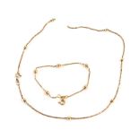 A 9ct gold necklace and bracelet set, with curb link neck chain and ball design, with clip in clasp,