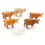 Five various Beswick calves, and a John Beswick collectors plaque. (6)