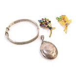 A silver bangle and locket, the plain design circular locket, 5cm high, together with a silver hinge