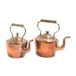 Two Victorian copper kettles, each of plain design, 32cm and 27cm high. (2)