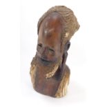 Tribal Art. A carved tribal bust of a gentleman, 24cm high.