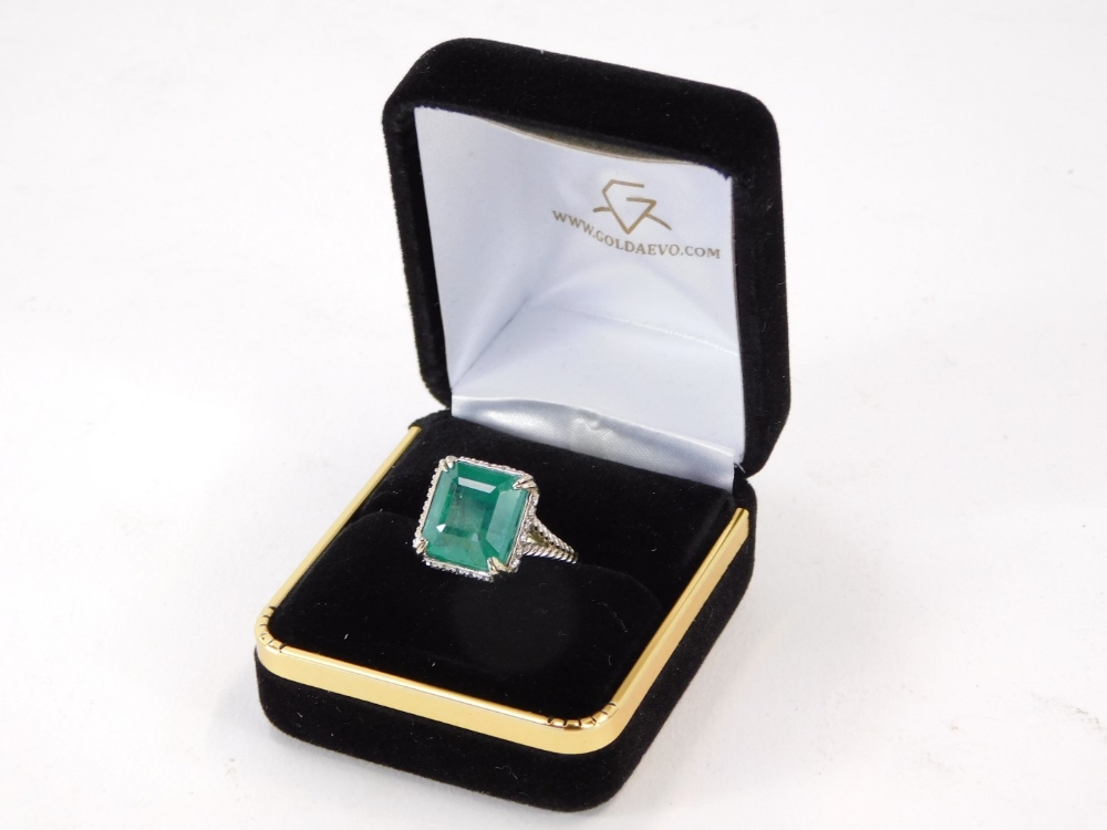 An emerald and diamond dress ring, with octagonal step cut emerald, measuring 12.10 x 11.11 x 8.77mm - Image 3 of 5