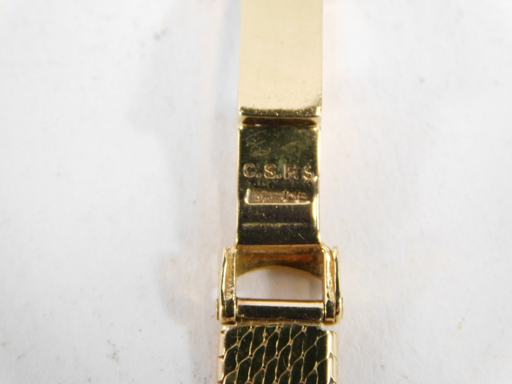 A 9ct gold Omega De Ville lady's wristwatch, with circular watch head, with 1.5cm dial, on bar set b - Image 4 of 5