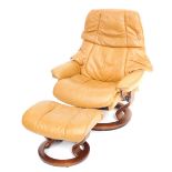 A Stressless tan leather swivel armchair and footsool.