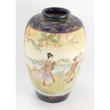 A late 20thC Satsuma vase, on a royal blue ground depicting Geisha, 30cm high.