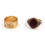 Two rings, comprising a 9ct gold signet ring, with red blood stone, and later soldered detailing, ri