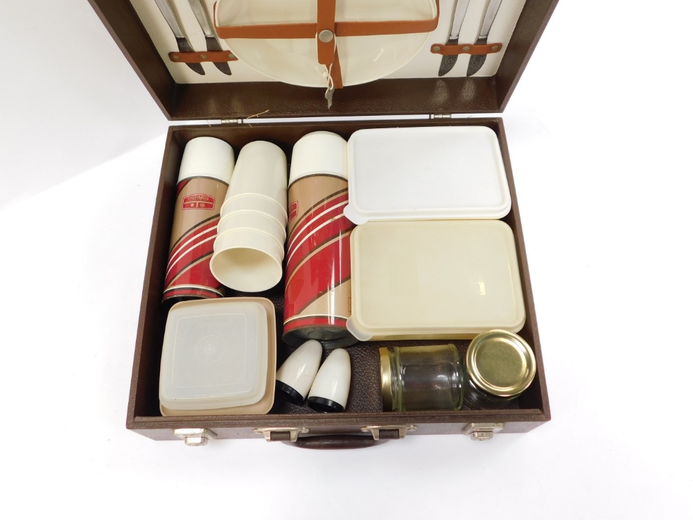 An Addis picnic hamper, in the Brexton style, with thermos and tupperwear, dinner plates and stainle - Image 2 of 4