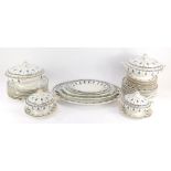 A late 19thC part dinner service, comprising a set of four graduated meat plates, two large tureens