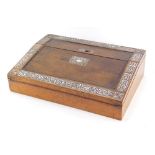 A late 19thC rosewood and mother of pearl inlaid writing box, the scroll detailed top and border ope