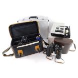 A group of camera and optics equipment, comprising a Leica P150 projector, a Sharpe Hi-8 viewcam and