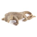 A carved wooden model of a lizard, 71cm long.