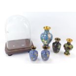 Five 20thC Chinese Cloisonne miniature baluster vases, and a modern glass dome.