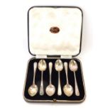 A set of six silver teaspoons, each with reeded border, maker J D and S, Sheffield 1960, in a J W Da
