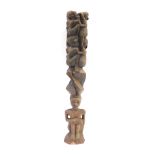 Tribal Art. A carved African totem, of intertwined figures, 59cm high.