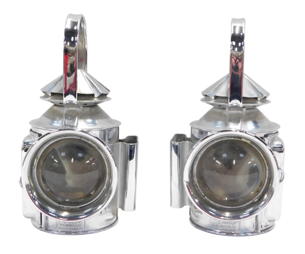 A pair of Griffiths & Son of Bradford Street Birmingham lanterns, in a chrome outer casing, 25cm hig