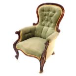 A Victorian mahogany spoon back armchair, the shield back with button detailing, 102cm high, 6