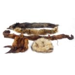 A group of furs, comprising fur stoles, hats and mittens. (1 box)