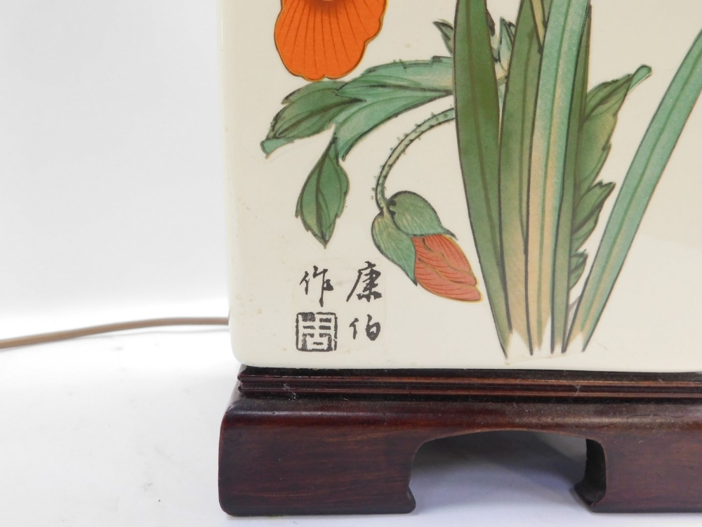 An Oriental ceramic table lamp, with painted detailing of red and white flowers, with butterflies an - Image 2 of 4