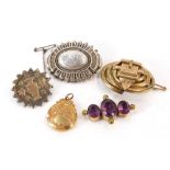 A group of Victorian and Edwardian jewellery, comprising two silver bar brooches, one circular with