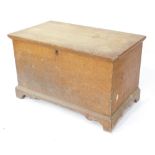 A Victorian painted pine blanket box, of plain design, converted with castors to base, 61cm high, 10