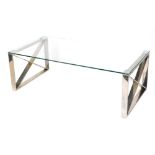 A mid century chrome and glass topped rectangular coffee table, the chrome cross and supports with a