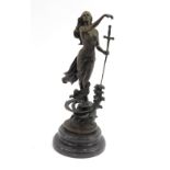After Milo. A cast bronze female figure, with sword, on plinth in water, on a stepped black marble b